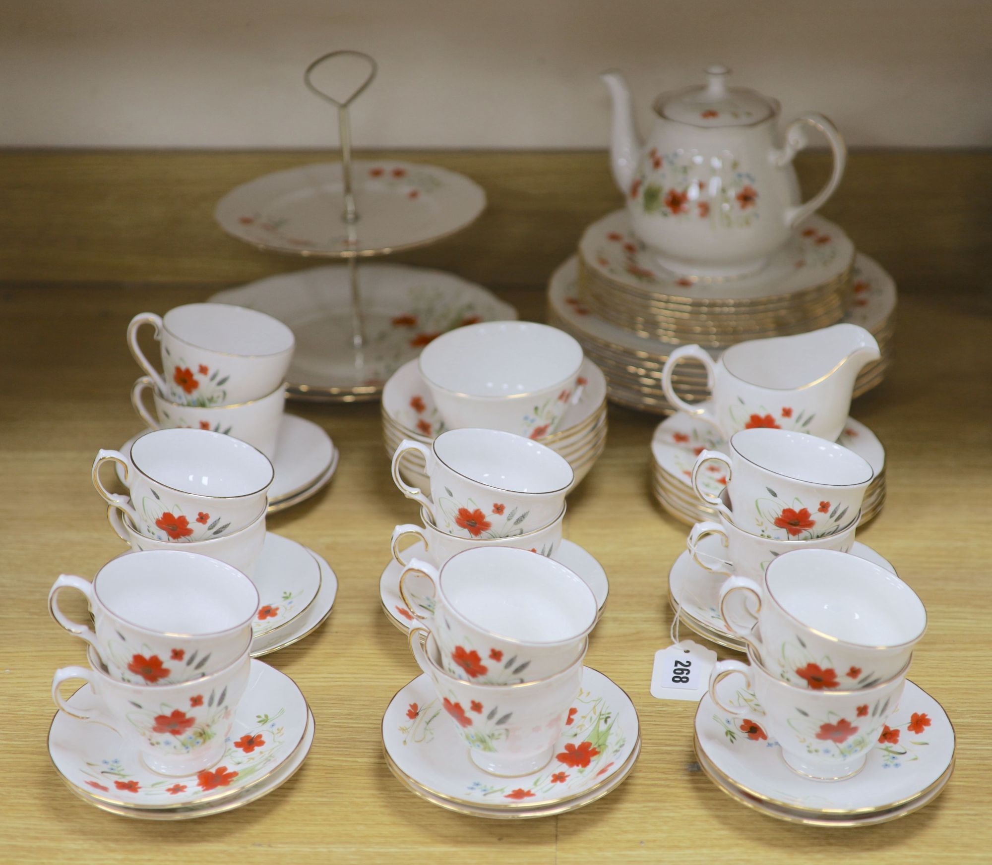 A Colclough floral decorated fifty nine piece part tea service